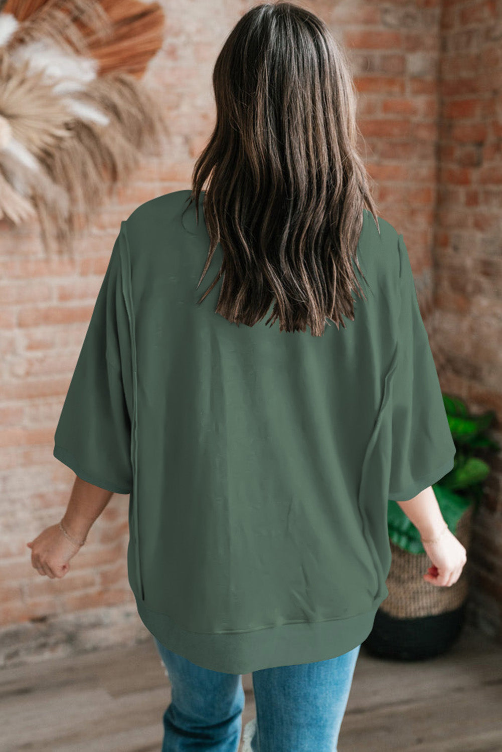 Bonbon Exposed Seam Pocket Side Split Loose T Shirt